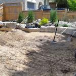 Landscaping a new front yard with an Armour Stone garden.