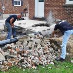 Breaking up a concrete patio.